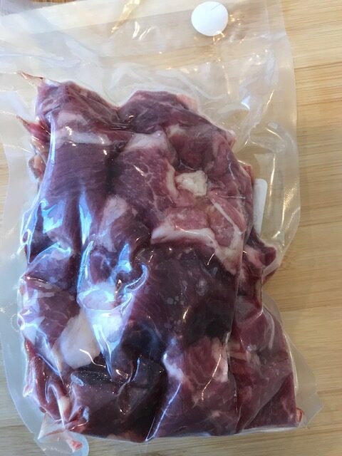 Bone-in goat stew meat for sale at Spice of Life Farm